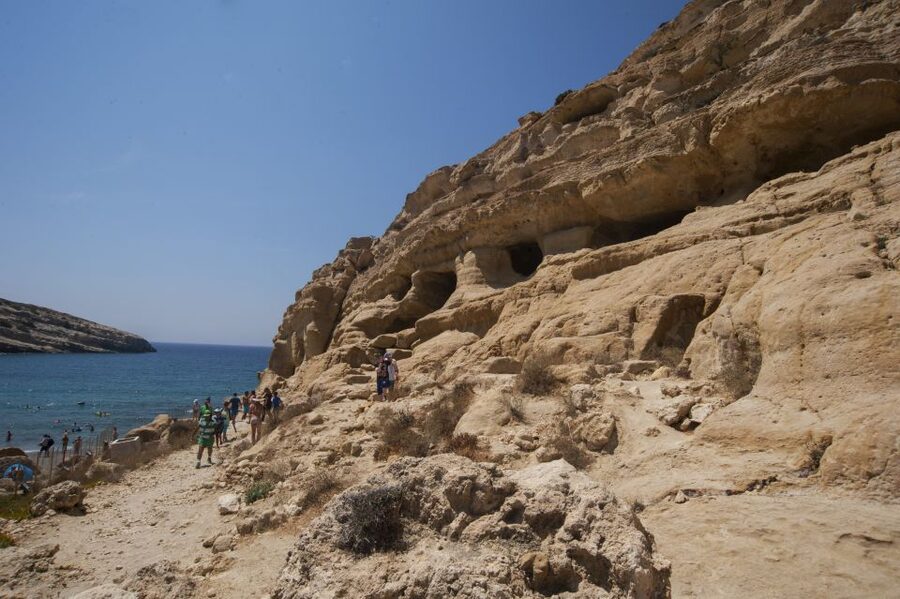 Crete: Matala Beach and Hippie caves, Red beach - Pickup and bus ride: the value of being dropped close to the action