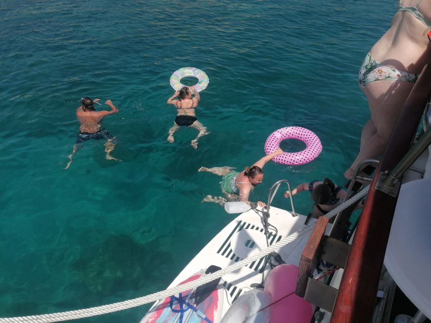 Crete: Snorkeling Boat Trip with Lunch and Transfer - Stalis and Hersonissos from the boat: passing the action without the scramble