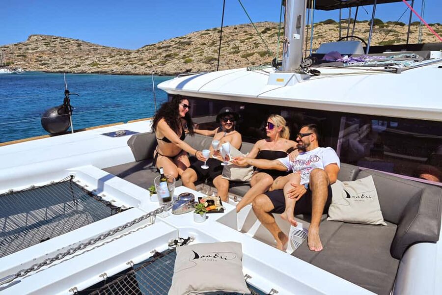 Heraklion: Dia Catamaran Tour - Lunch, Open Bar & Snorkeling - The morning cruise: welcome pies, Wi-Fi, and that first stretch