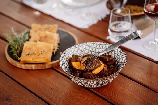 Heraklion Private Half-Day Gastronomy Diaries Experience in Lyrarakis Winery - Your Cretan lunch: beef stew, cuttlefish with wild greens, and galaktoboureko