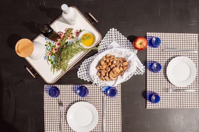 Heraklion Private Half-Day Gastronomy Diaries Experience in Lyrarakis Winery - Stop 1 at Lyrarakis Winery: vineyard first, then the olive tree tasting table