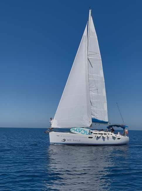 Heraklion: Sailing Trip to Dia Island with Lunch & Swimming - Sailing out from Heraklion: dolphins, scenic coast, and a calm rhythm