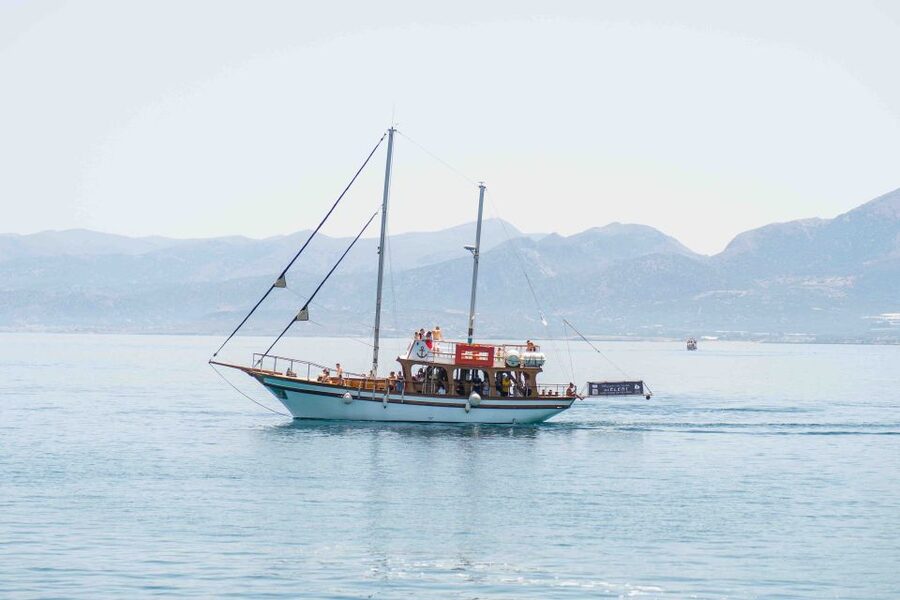 Hersonisos: Boat Cruise with Swim Stops and Lunch - Getting on Board at Eleni Traditional Wooden Boat in Hersonissos