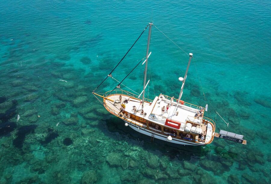 Hersonisos: Boat Cruise with Swim Stops and Lunch - Onboard Music, Guide Help, and How You’ll Spend Your Time
