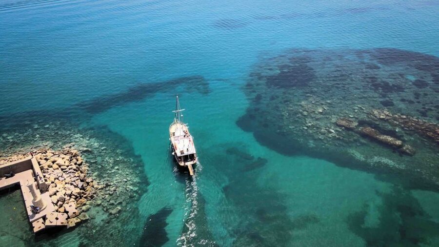 Hersonisos: Boat Cruise with Swim Stops and Lunch - St. George Bay Swim Stop: Clear Water and Easy On/Off