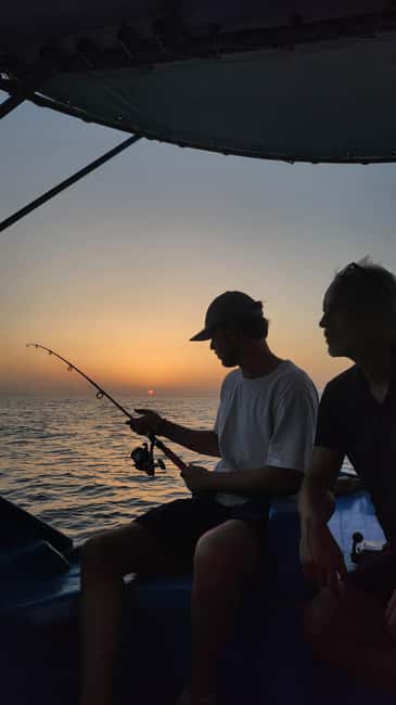 Hersonissos: Agapi Fishing Trips Sunset Cruise - Language, group size, and the vibe on board
